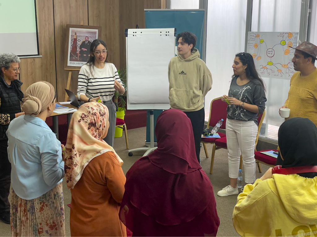 ADFM participants in a circle discussing family law