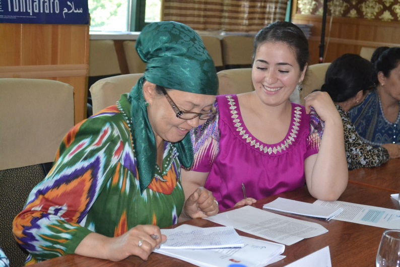 Kazakhstan Two Women Writing Photo