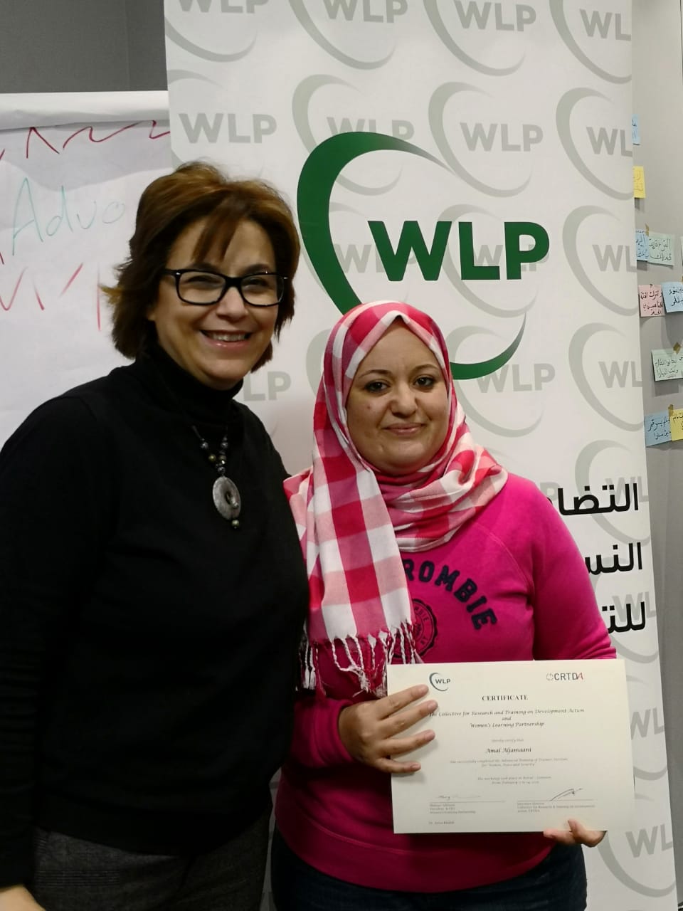 Amal Al Jamani Accepts Certificate 